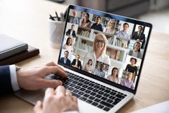 Diverse people engaged in group video call, computer monitor view