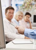 Businessman speaking on presentation stock images Businessman speaking on presentation stock images