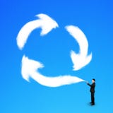 Businessman spraying out clouds recycling symbol stock photography Businessman spraying out clouds recycling symbol stock photography