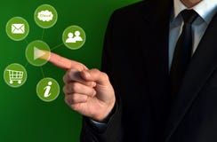 Businessman touching virtual icons Royalty Free Stock Image Businessman touching virtual icons Royalty Free Stock Image