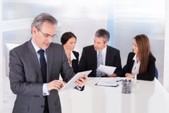 Businessman Using Digital Tablet royalty free stock photography Businessman Using Digital Tablet royalty free stock photography