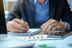 Businessman using smatphone for analysis maketing plan stock image Businessman using smatphone for analysis maketing plan stock image