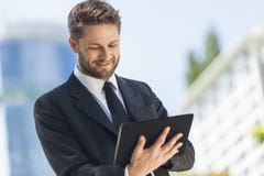 Businessman Using Tablet Computer