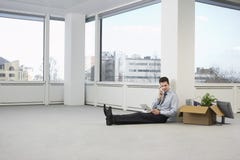 Businessman Using Telephone In New Office Stock Photos Businessman Using Telephone In New Office Stock Photos