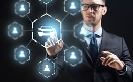 Businessman with virual hologram of car sharing stock image Businessman with virual hologram of car sharing stock image