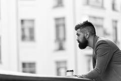 Businessman well groomed appearance enjoy coffee break out of business center urban background. Relax and recharge. Man royalty free stock photo Businessman well groomed appearance enjoy coffee break out of business center urban background. Relax and recharge. Man royalty free stock photo