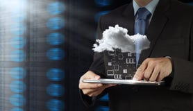 Businessman working with a Cloud Computing royalty free stock photography Businessman working with a Cloud Computing royalty free stock photography