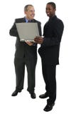 Businessmen Standing with Laptop Computer