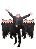 Businessmen With Hands Up And People Background Stock Photography