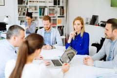 Businesspeople collaborating in office royalty free stock photography Businesspeople collaborating in office royalty free stock photography