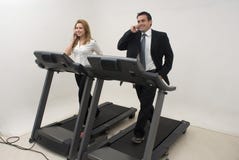 Businesspeople On Treadmill - Horizontal Stock Image