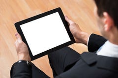 Businessperson gebruikend digitale tablet stock foto Businessperson gebruikend digitale tablet stock foto