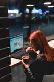 Businesswoman, girl working on laptop in cafe, smartphone, pen, use computer. Freelancer works remotely. Online marketing, royalty free stock photo Businesswoman, girl working on laptop in cafe, smartphone, pen, use computer. Freelancer works remotely. Online marketing, royalty free stock photo