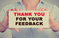 Businesswoman hands holding card with Thank you for your feedback message