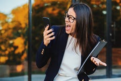 Businesswoman screaming on mobile phone. Having nervous breakdown at work, screaming in anger, stress management, mental royalty free stock photo Businesswoman screaming on mobile phone. Having nervous breakdown at work, screaming in anger, stress management, mental royalty free stock photo