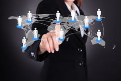 Businesswoman touching world map Royalty Free Stock Photography Businesswoman touching world map Royalty Free Stock Photography