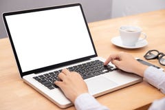 Businesswoman working with notebook laptop computer, using finger with keyboard for typing. computer laptop with blank screen royalty free stock image Businesswoman working with notebook laptop computer, using finger with keyboard for typing. computer laptop with blank screen royalty free stock image