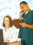 Busy Medical Staff Doing Various Things Royalty Free Stock Photography Busy Medical Staff Doing Various Things Royalty Free Stock Photography