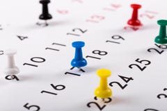 Busy Schedule - Colorful Pins On A Calendar Royalty Free Stock Images Busy Schedule - Colorful Pins On A Calendar Royalty Free Stock Images