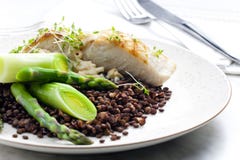 Butterfish with green lentils stock photo Butterfish with green lentils stock photo