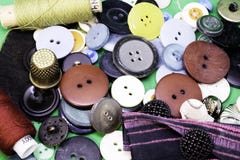 Buttons, threads and thimble are on the table stock image Buttons, threads and thimble are on the table stock image