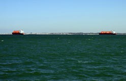Ships in the harbor of the seaport of Cadiz on the shores of the Cadiz Bay of the Atlantic Ocean. Royalty Free Stock Photography Ships in the harbor of the seaport of Cadiz on the shores of the Cadiz Bay of the Atlantic Ocean. Royalty Free Stock Photography