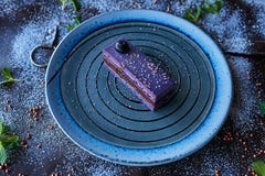 Chocolate cake in powdered sugar royalty free stock photography Chocolate cake in powdered sugar royalty free stock photography