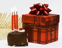 Cake With Candles And Gift Royalty Free Stock Photography