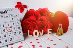 Calendar page with a red hand written heart highlight on February 14 of Saint Valentines day stock photo Calendar page with a red hand written heart highlight on February 14 of Saint Valentines day stock photo
