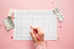 Calendario para el mes y la marca del ciclo menstrual PMS y el concepto cr?tico de los d?as imagen de archivo libre de regalías Calendario para el mes y la marca del ciclo menstrual PMS y el concepto cr?tico de los d?as imagen de archivo libre de regalías