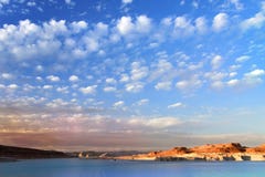 California. USA. October 2012. View of a hilly desert with beautiful clouds without defects royalty free stock images California. USA. October 2012. View of a hilly desert with beautiful clouds without defects royalty free stock images
