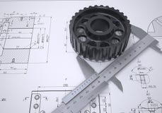 Caliper And Gear In The Drawing Royalty Free Stock Photos