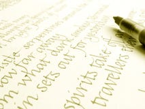 Calligraphy pen and hand writing stock image Calligraphy pen and hand writing stock image