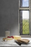 Camembert, Parmesan cheese, butter, Milk and protein bread on sill Stock Photography Camembert, Parmesan cheese, butter, Milk and protein bread on sill Stock Photography