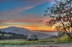 Camper van camping with sunrise stock images Camper van camping with sunrise stock images