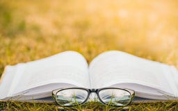 Reading in nature. Outdoor recreation reading a book. stock photos Reading in nature. Outdoor recreation reading a book. stock photos