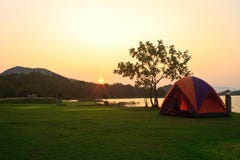 Camping Ground And Sunset At Lake Stock Images