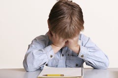 Can't do it. Young boy frustrated with school or with learning difficulties Can't do it. Young boy frustrated with school or with learning difficulties