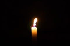 Candle flame against isolated on black background royalty free stock images Candle flame against isolated on black background royalty free stock images
