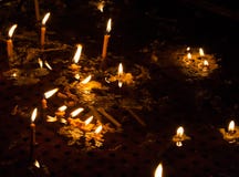 Candles in water from the Church stock image Candles in water from the Church stock image