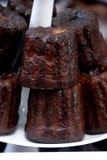 Cannelé de Бордо для торжества дня Бастилии стоковые фотографии rf Cannelé de Бордо для торжества дня Бастилии стоковые фотографии rf