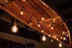 Canoe Hanging From Ceiling With String Lights Stock Image