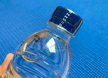Cap seal on bottle of blue background royalty free stock image Cap seal on bottle of blue background royalty free stock image