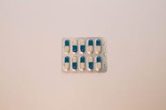Capsules medication in white and blue packaging. 10 stock photos Capsules medication in white and blue packaging. 10 stock photos