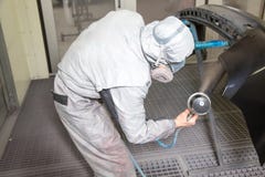 Car body painter spraying paint on bodywork parts royalty free stock photos Car body painter spraying paint on bodywork parts royalty free stock photos