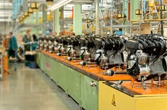Car engines on factory assembly line. Royalty Free Stock Photos Car engines on factory assembly line. Royalty Free Stock Photos