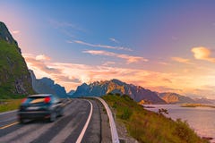 Car on road in Norway, Europe. Sunset travel Stock Image Car on road in Norway, Europe. Sunset travel Stock Image