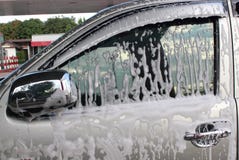 Car wash foam on side door royalty free stock image Car wash foam on side door royalty free stock image