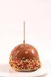 Caramel Apple With Sprinkles Royalty Free Stock Images