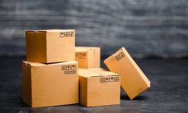 Cardboard boxes. The concept of packing goods, sending orders to customers. Warehouse of finished products and equipment. Moving